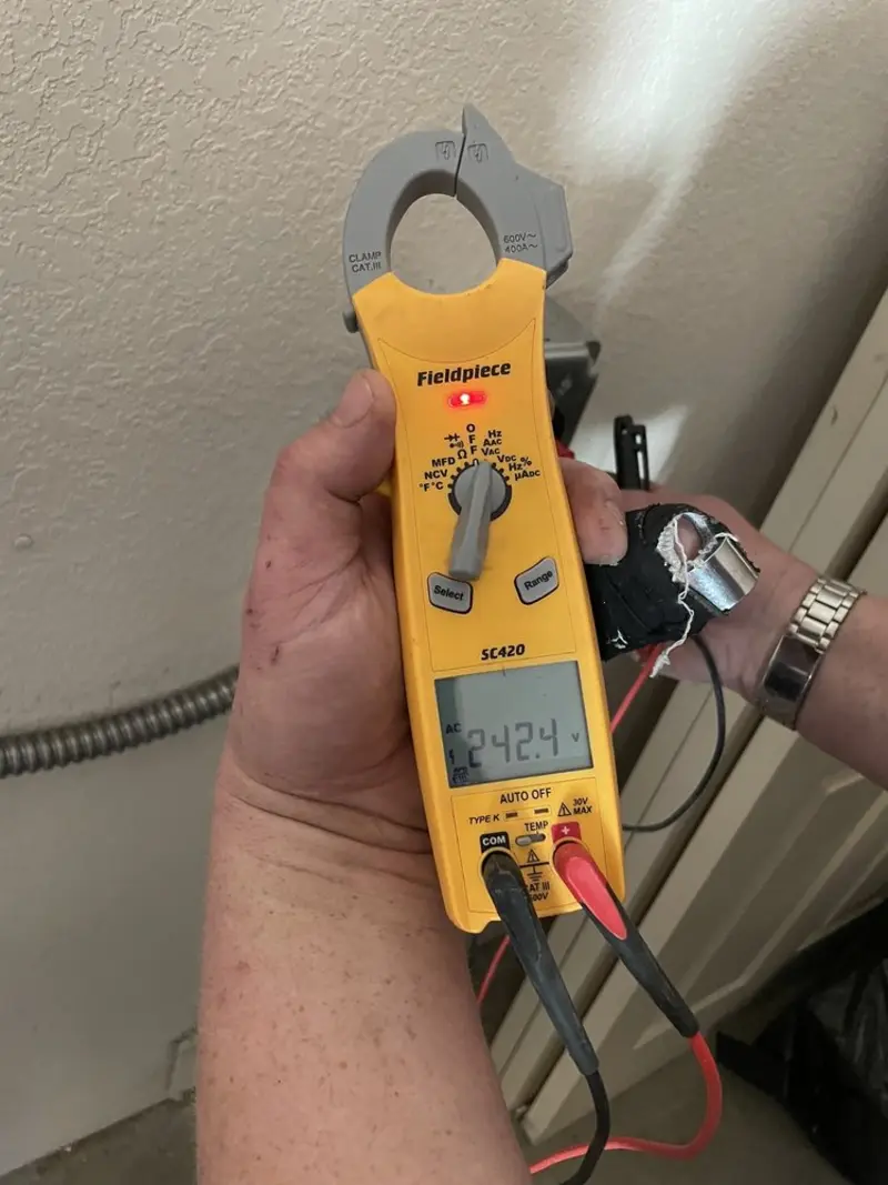 Voltage testing with clamp meter during Generator Installation in Parkway